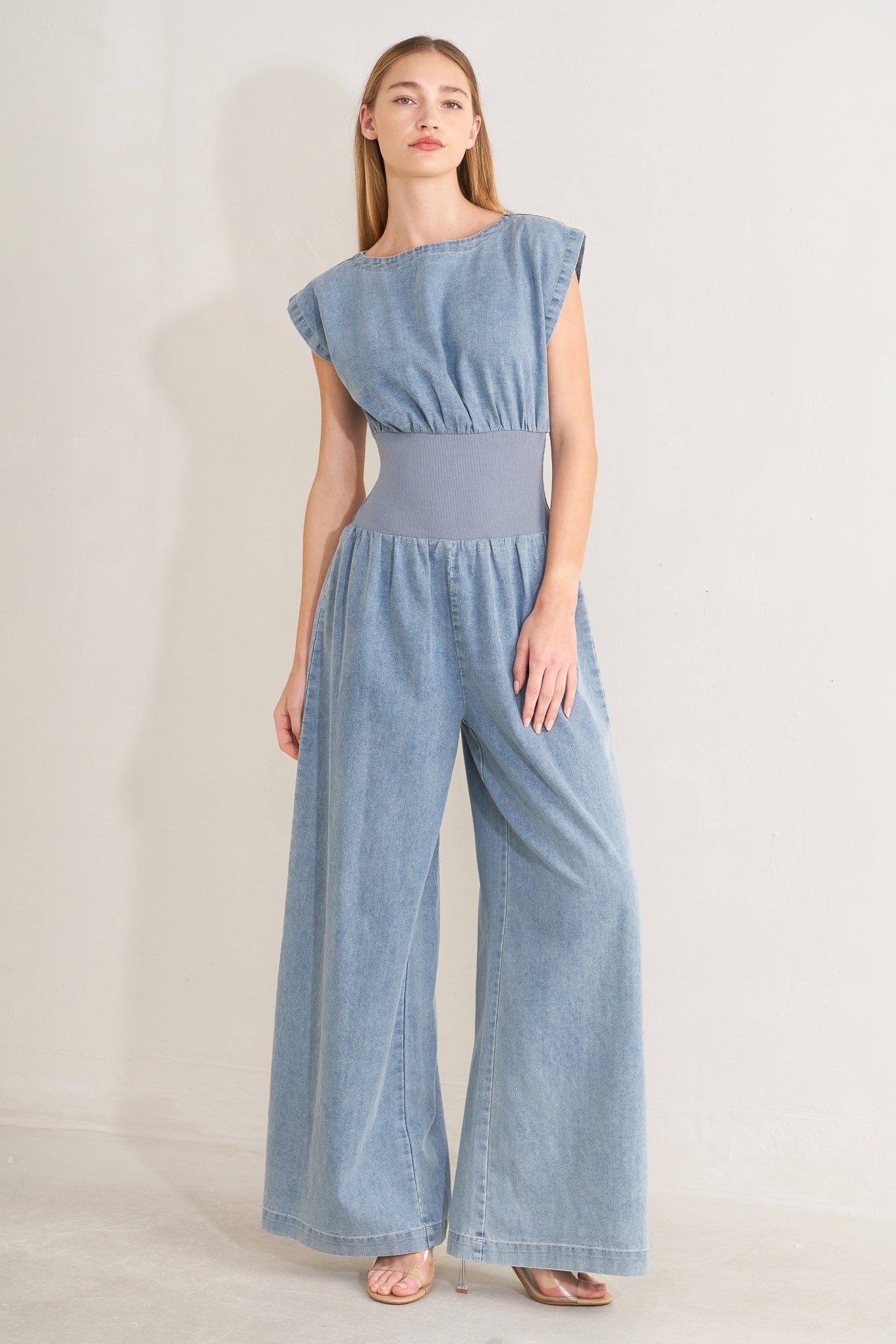 RUNNING IN DENIM JUMPSUIT