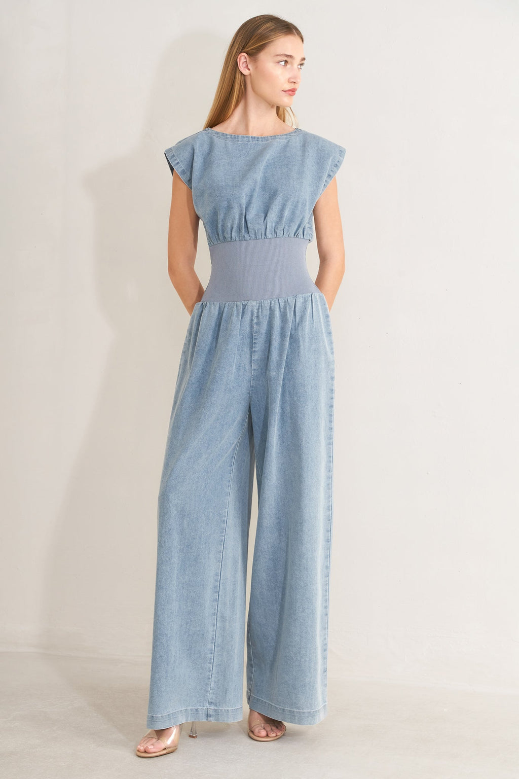 RUNNING IN DENIM JUMPSUIT