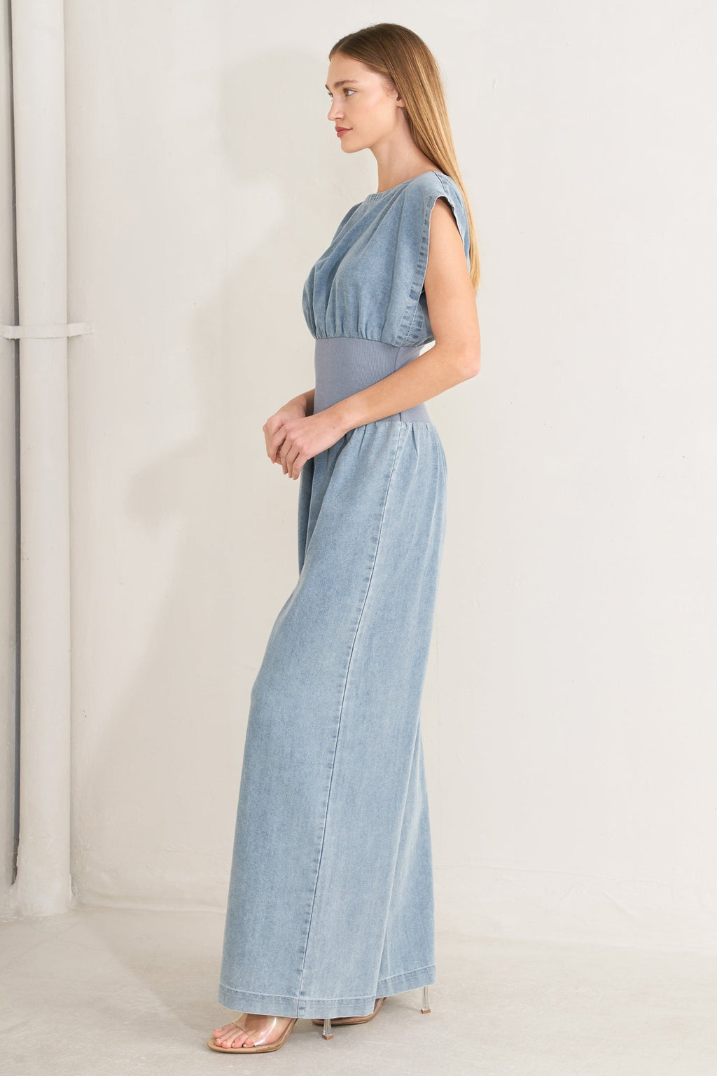 RUNNING IN DENIM JUMPSUIT