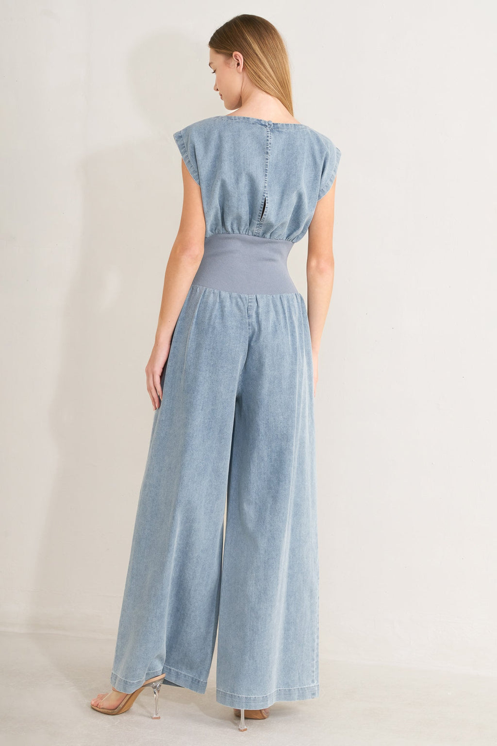 RUNNING IN DENIM JUMPSUIT