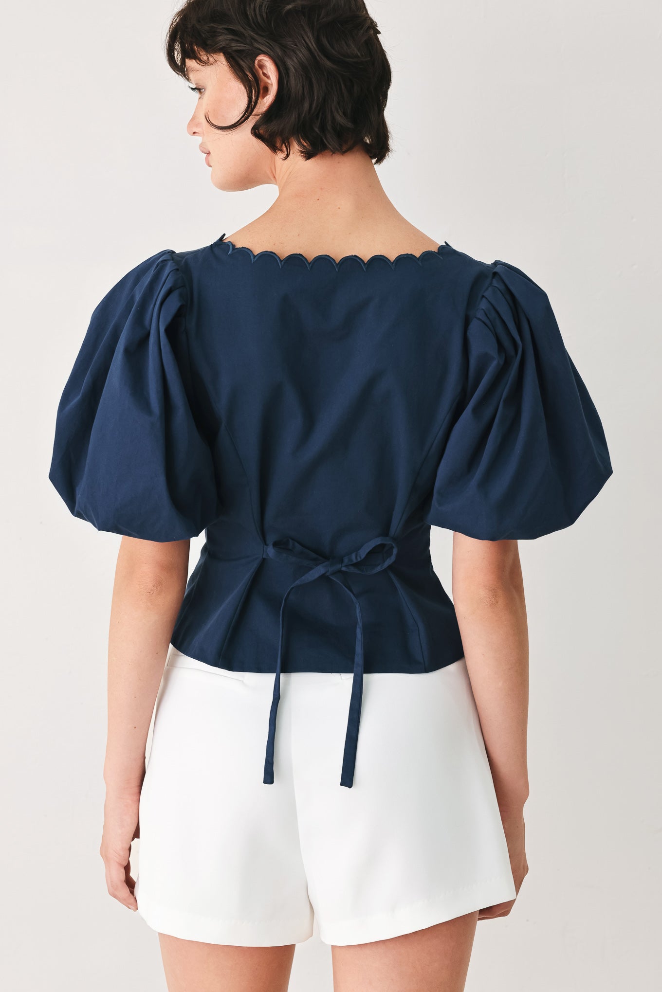 NEVER ORDINARY WOVEN TOP