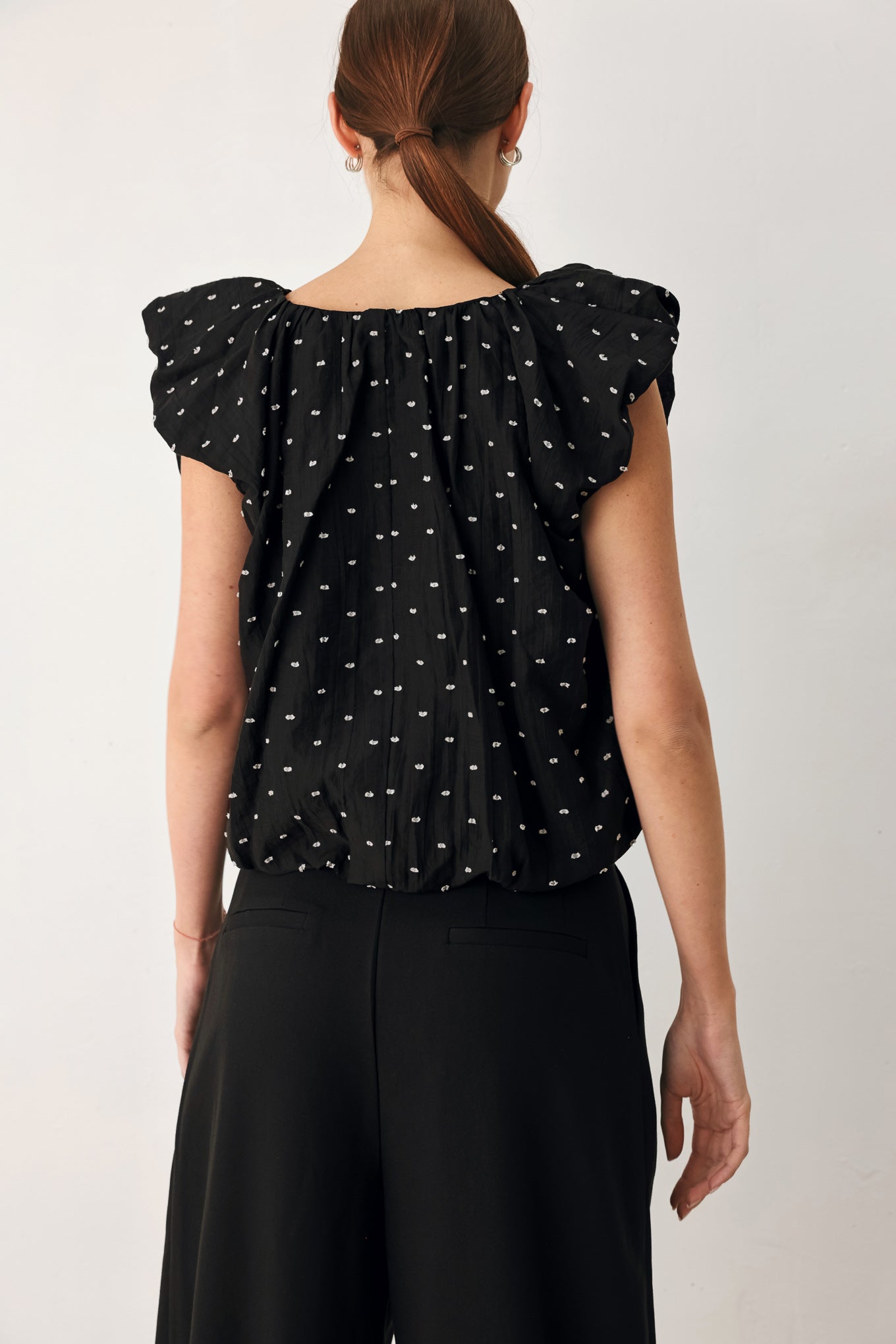 POLKA FLUTTER WOVEN TOP