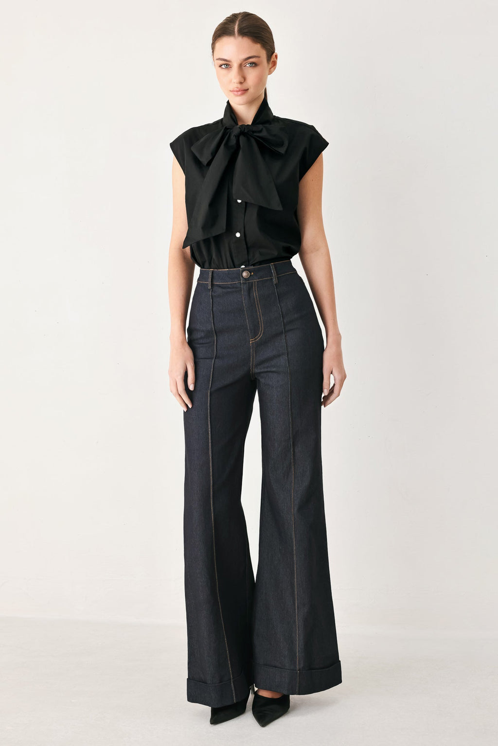 MODERN STATEMENT BOW WOVEN TOP