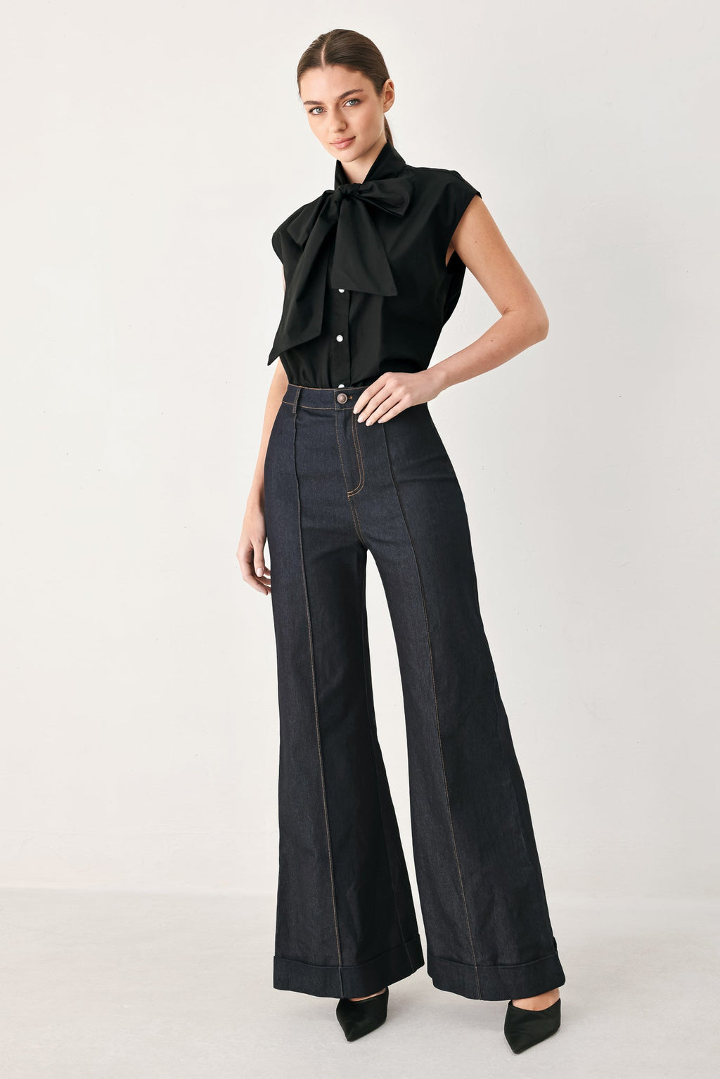 MODERN STATEMENT BOW WOVEN TOP