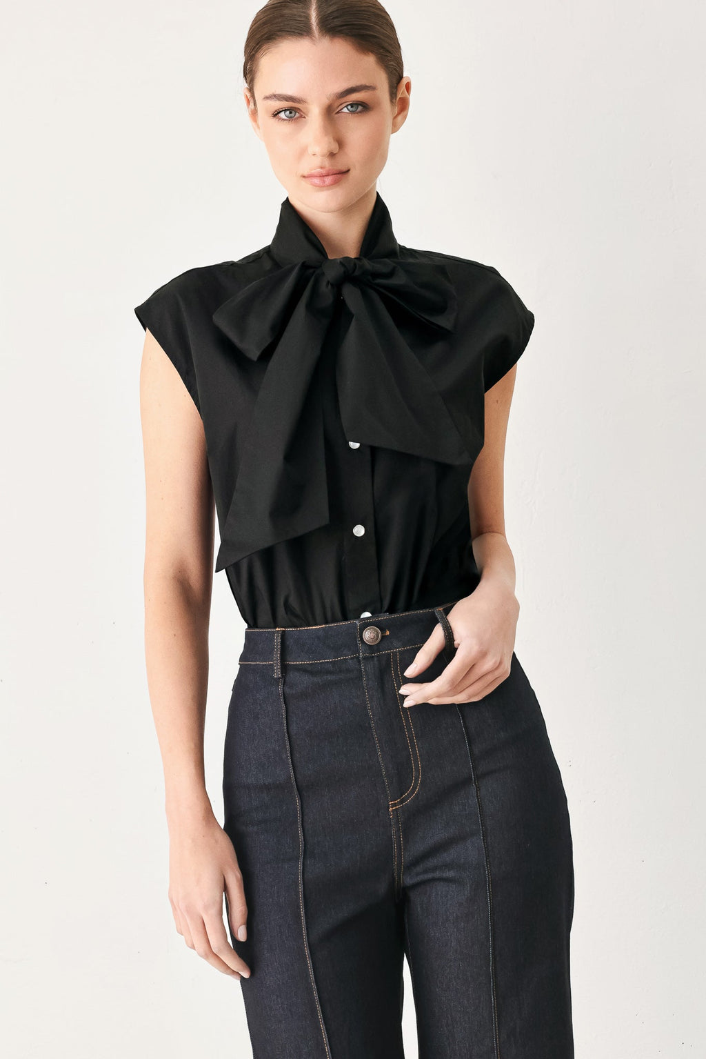 MODERN STATEMENT BOW WOVEN TOP